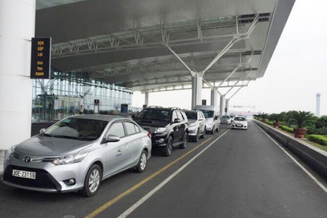 Airport Transfer (From Hotel in Hoi An to Da Nang Airport) 7 Seat Car - On the road: Dragon Bridge and Marble Mountains from the window