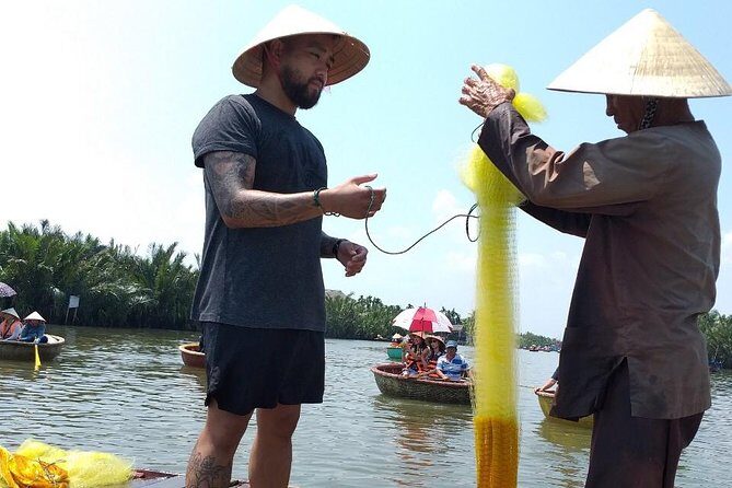 Buffalo riding and Basket Boat Half Day Tour - From Busy Old Town to Cam Thanh Water Trails