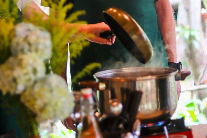 Cocolocal Farm Cooking Class with market tour and basket boat - Hands-on cooking with Suong: Banh Xeo, Pho, papaya salad, and Spring Rolls