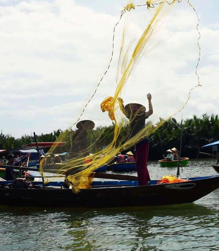 Coconut Boat Hoi An - Fishing nets and crab catching: hands-on river life, not a demo