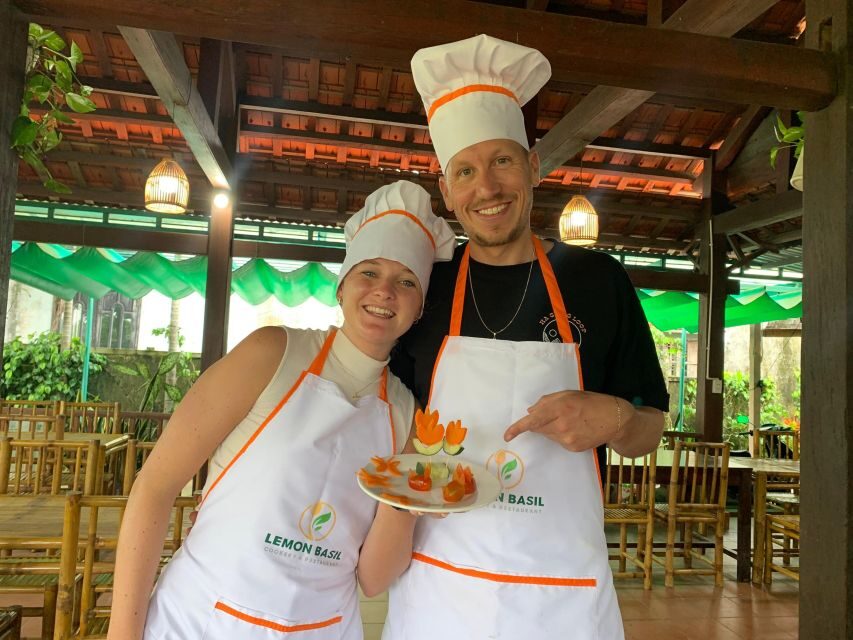 From Hoi An: Cooking Class at Organic Farm - Tra Que Spring Rolls: rolling with herbs you actually saw growing