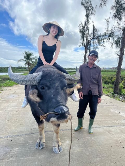 Funny day cycling, Buffalo riding and Basket boat - Riding water buffalo with a local farmer