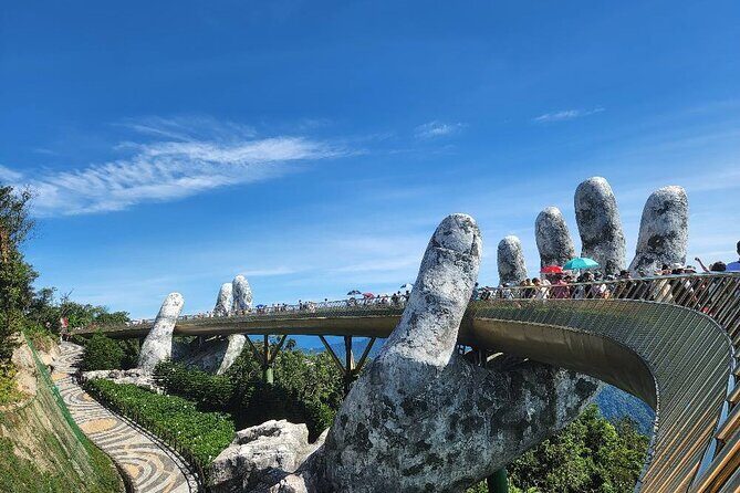 Golden Bridge - Monkey Mountain- Marble Mountains - Dragon Bridge - Cable car ride: the long ascent that sets the tone