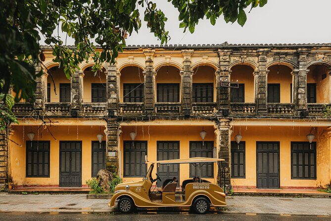 Heritage Adventure Private Tour by Electric Car - Cam Nam Island: the Old Town skyline from across the river
