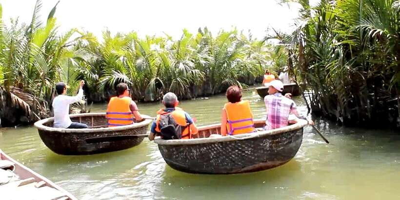 Hoi An: Basket Boat Tour by River Boat and Lantern Release - Cruiser ride to Bảy Mẫu Coconut Forest: calm water first