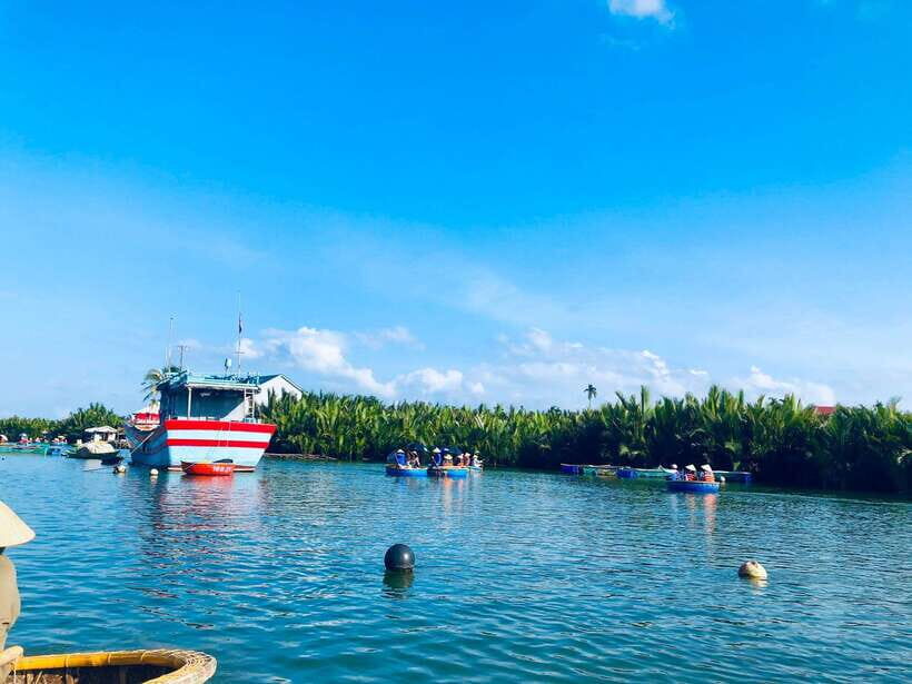 Hoi An: Coconut Basket Boat Rides with Two-way Transfers - Entering Cam Thanh Coconut Village by Boat: Calm Water, Tall Palms