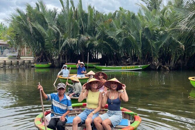 Hoi An countryside cycling Tour,Basket Boat-organic farming-lunch - Water buffalo riding and feeding: the part that always gets laughs