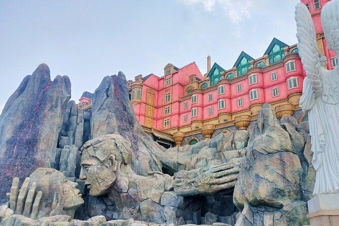 Hoi An/Da Nang: Golden Bridge, My Son Sanctuary & Marble Mountain - Marble Mountains: stone dragons, Buddha figures, and a cave-style pause