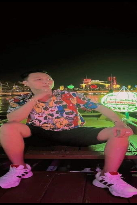 Hoi An : Lantern Boat Ride & Release Lanterns - The night boat pier stop: lights, calm, and photo time