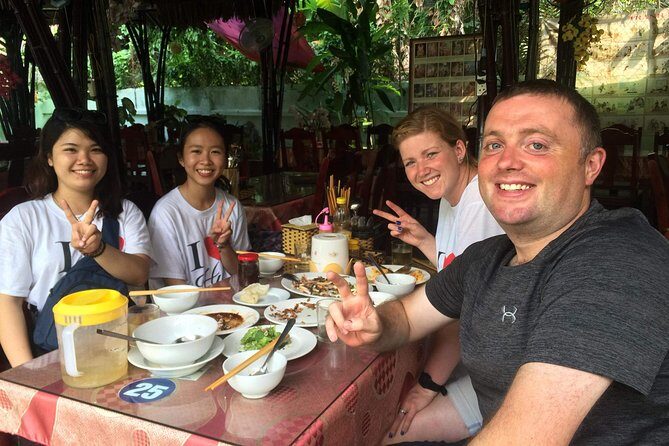 Hoi An Street Food Tour By Scooter - Stop 1: Hoi An Night Market Bites and Street Energy