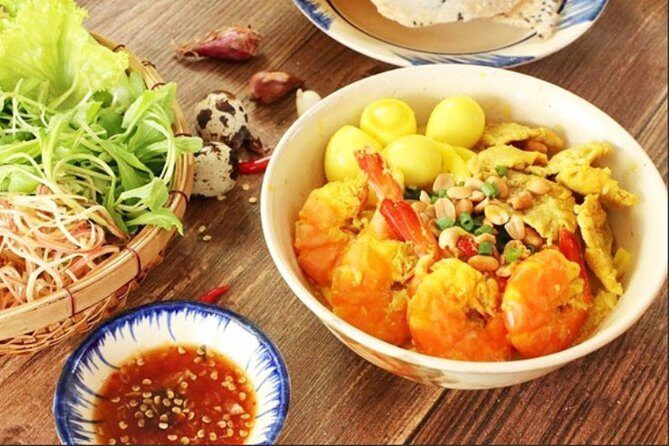 Hoi An Street Food Tour- The Real Taste Of Hoi An - Stop 3: Mì Quảng Ông Hai (Mr. Hai) and the logic of Quảng noodles