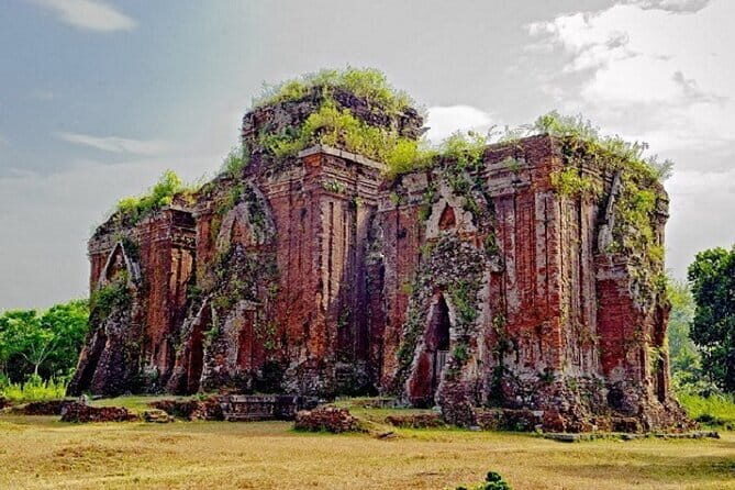 Ky Anh Tunnel & Cham Old Tower By Private Tour History of War - Chien Dan Cham Tower: relief friezes that echo Khmer craftsmanship