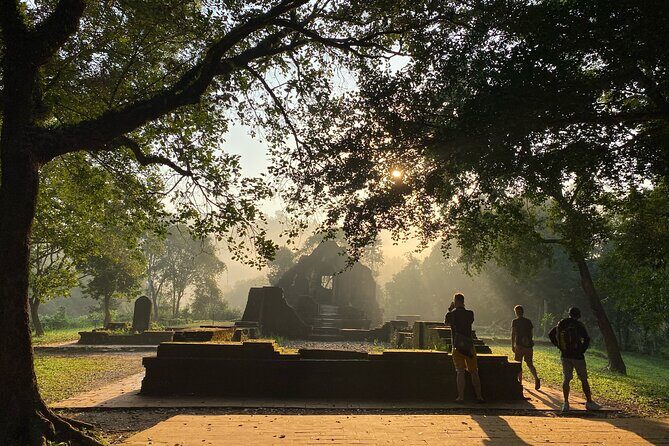 My Son Sanctuary Early Morning Tour 6 am w Banh my and Coffee - Entering the ruins with an English-speaking guide